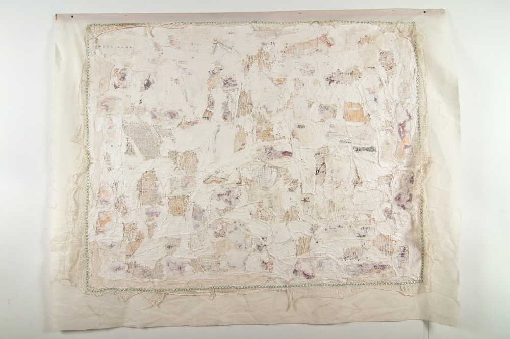 Fabric, map, bandages, plaster and green thread
183X145 cm Wounded Land Map