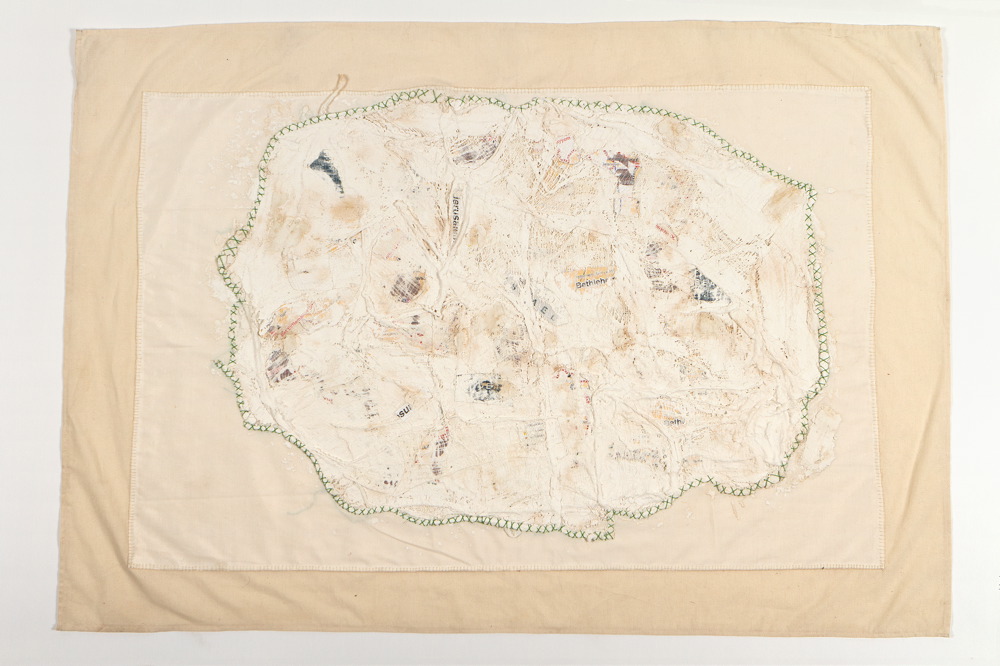 Fabric, map, bandages, plaster and green thread
123X90 cm Wounded Land Map