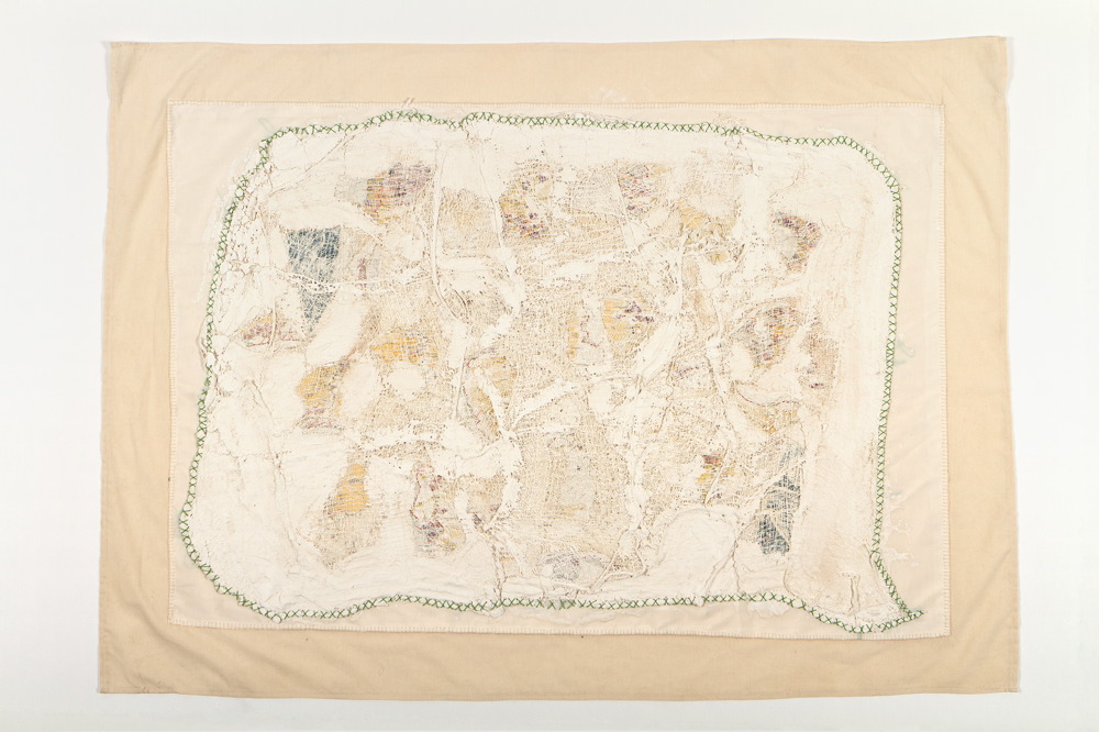 Fabric, map, bandages, plaster and green thread
124X87 cm Wounded Land Map