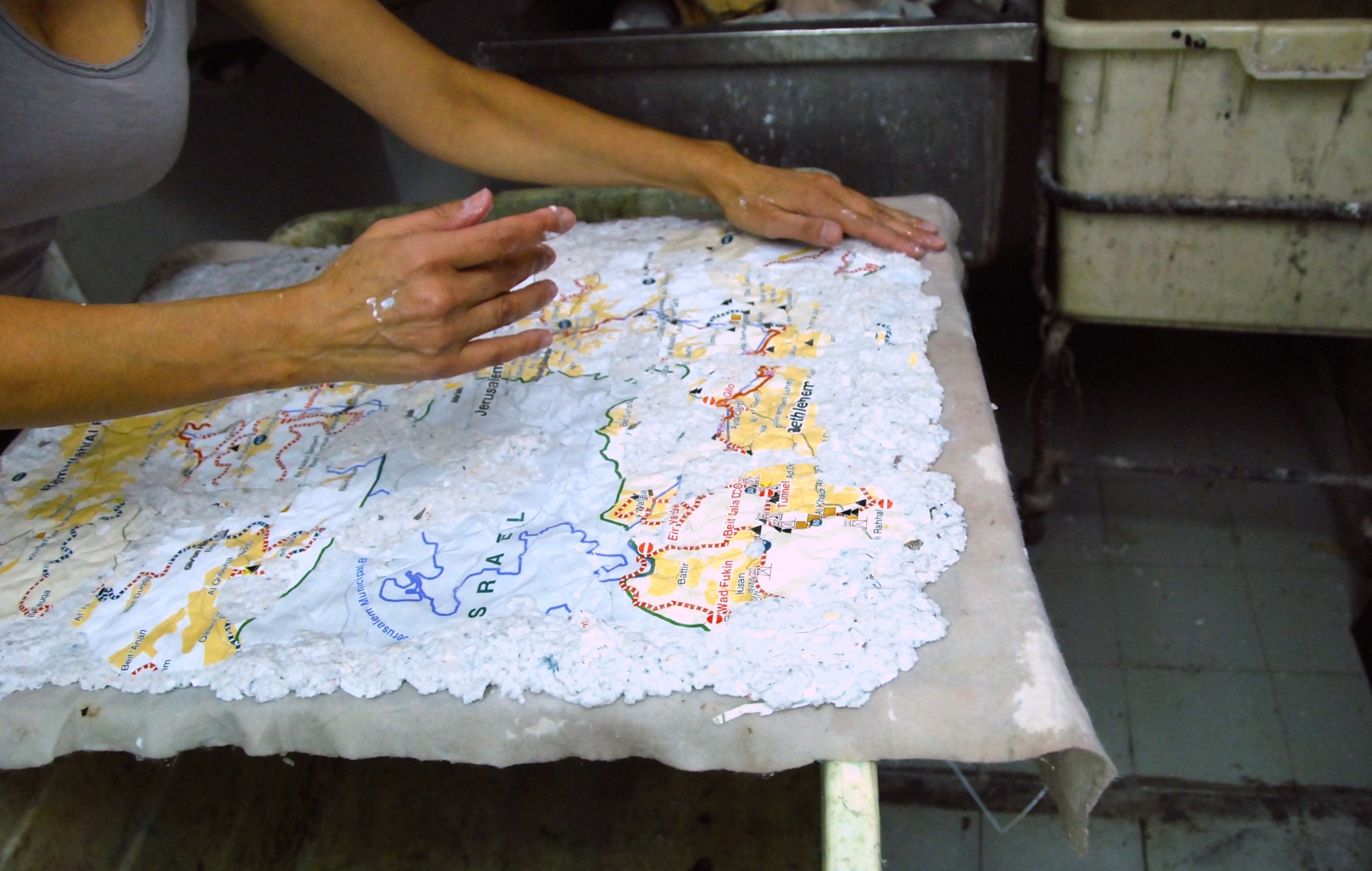 Creating new shredded maps at the Bezalel paper workshop (2010) 007