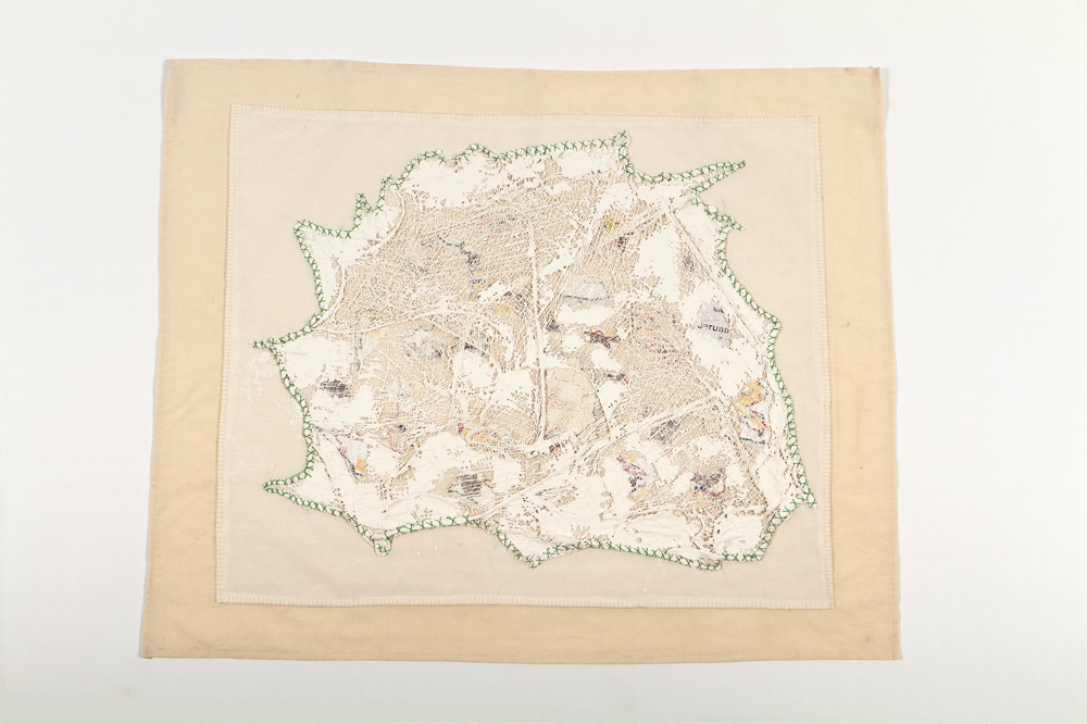 Fabric, map, bandages, plaster and green thread
73X89 cm Wounded Land Map