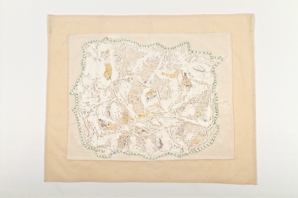 Fabric, map, bandages, plaster and green thread
88X71 cm Wounded Land Map