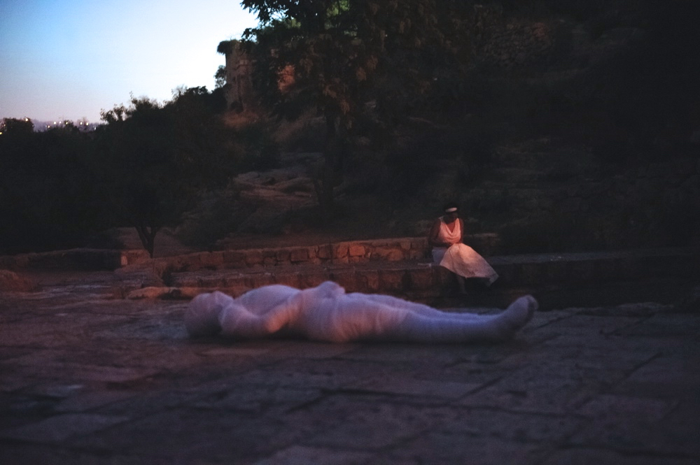 Sewing a Wounded Map by the Lifta Spring (2013) and bringing to life the spirit of the place which metamorphoses itself at dawn into a young maid. Ariane_571