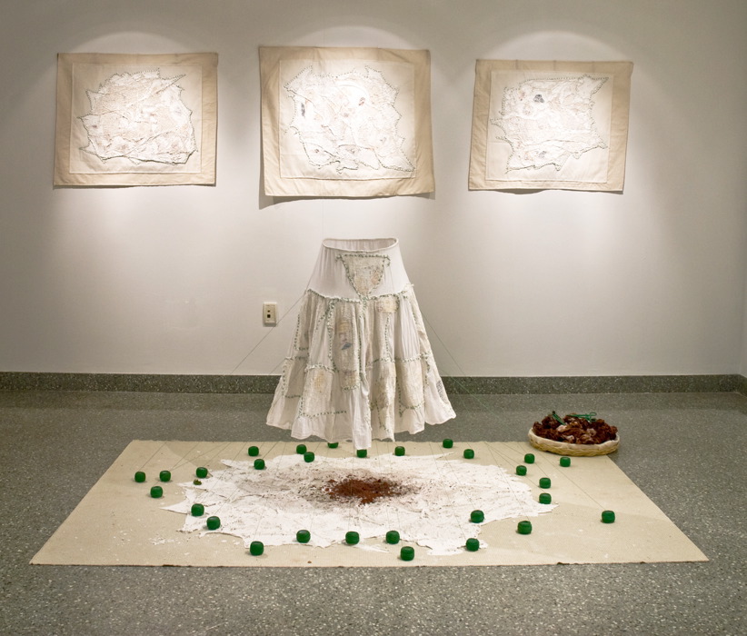 The Dressed Land (2012), installation, fabric, maps of Jerusalem, bandages, green spools, plaster, wax, pigment and earth
Borderline 002