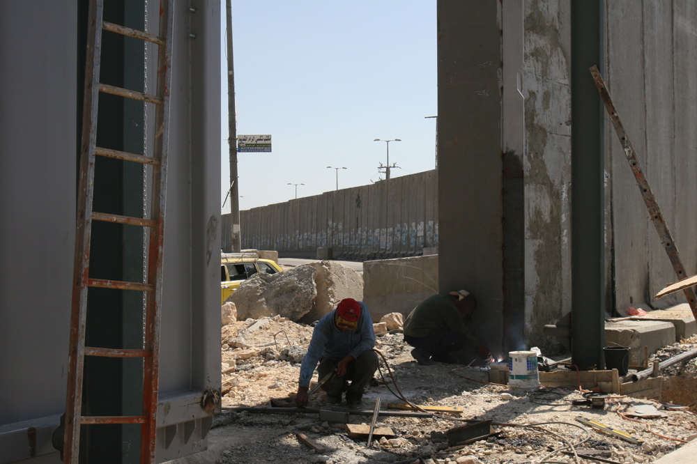 Closing the last part of the Wall at Kalandiya checkpoint, June 2006 Closing the Wall, Kalandia,June 2006 02