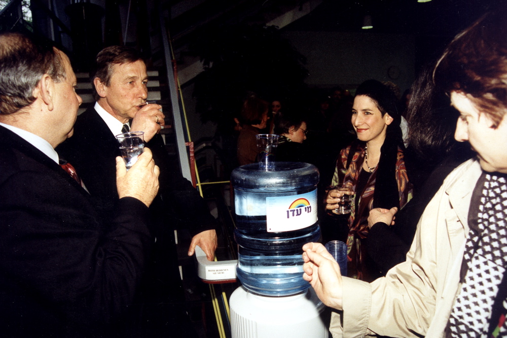 The Minister Wolfgang Clement tastes the Holy Water at the opening of the Young Israeli Art Exhibition at the Ministry of Economic Affairs of North Rhine Westphalia in Dusseldorf, April 1998 Dusseldorf 10