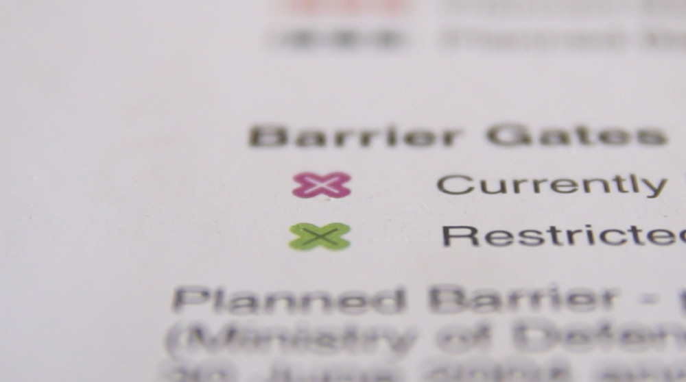 The green X symbolising the barriers gates on OCHA maps Green Land 005