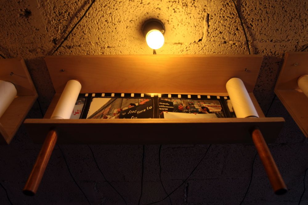The Jerusalem Scrolls (Abu Dis 2003), wood, photographs and yellow light, 20 x 60 x 25 cm
The Jerusalem’s Scrolls, 02