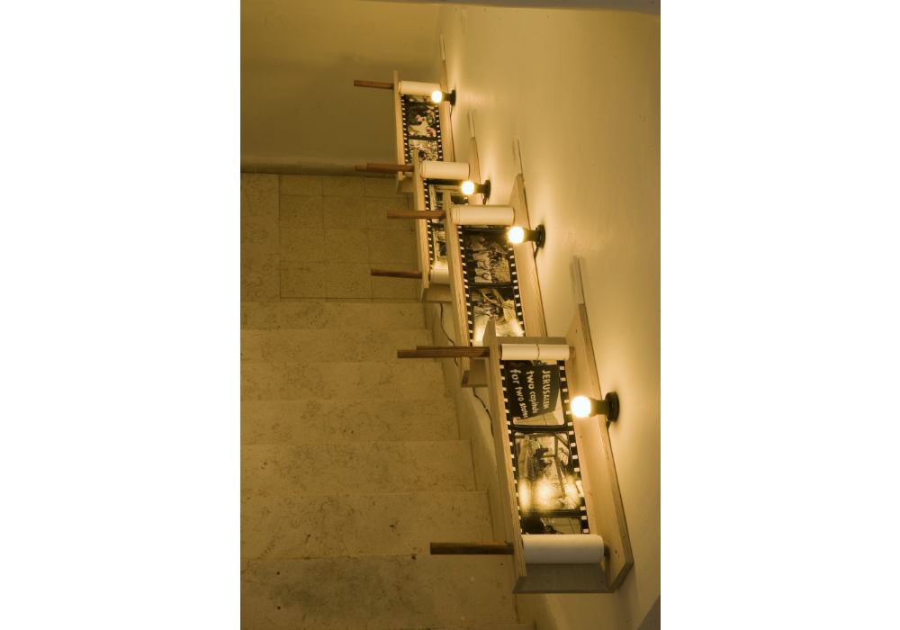 Installation in the staircase of 'The Jerusalem Scrolls' wood, photographs and yellow light, 20 x 60 x 25cm
The house 007