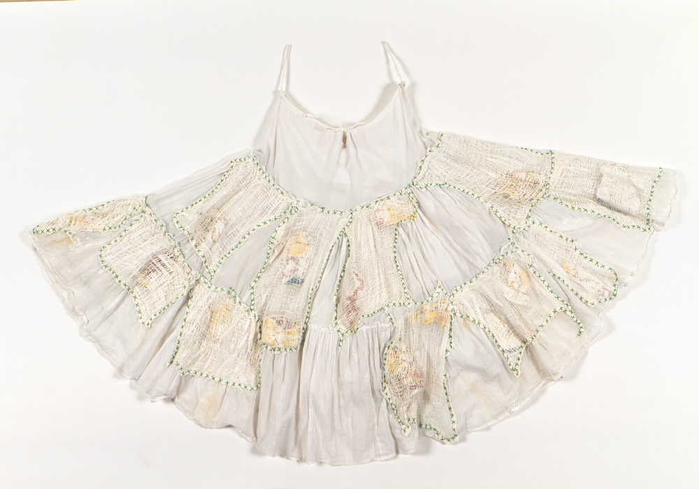 Dress with maps, bandages and green stitches